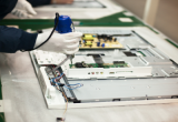 Man working on circuit board